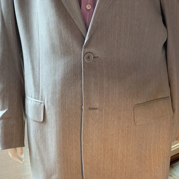 Light gray suit with baby blue pinstriped. 42L